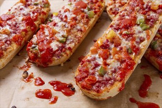 Pizza on a baguette, top view, close-up, no people, fast food, street food