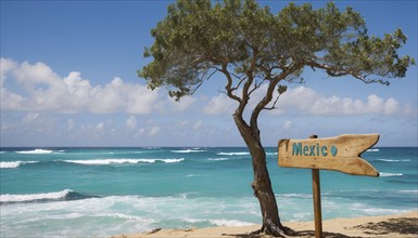 Sign pointing to the direction of Mexico with scenic beach and ocean in the background, AI