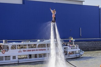 Harbour festival in Stuttgart. Spectacular jet ski and flyboard show on the Neckar. Stuttgart,