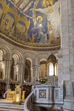 Large mosaic above the altar of a church, depicting Jesus with upraised arms, Paris