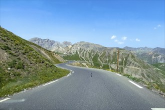 Mountain road from Col de la Bonette to Col de Raspaillon in high mountains above tree line, French