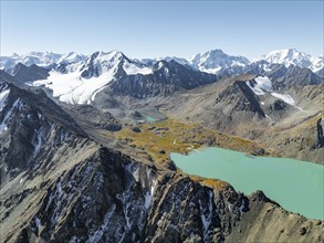 Mountain panorama, aerial view, 4000 metre peak with glacier, mountain pass and mountain lake