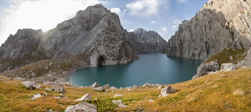 Mountain lake Kol Suu rocky steep mountains, sun star, Kol Suu Lake, Sary Beles Mountains, Naryn