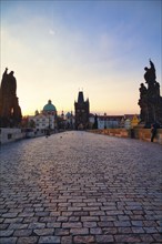 Charles Bridge with Old Town Bridge Tower, morning atmosphere, Prague, Czech Republic, Europe