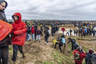 Many thousands of demonstrators march after a demonstration against the demolition of the lignite