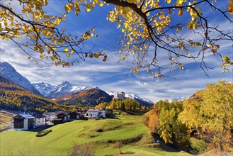 Village view of Tarasp with castle in autumn, Scuol, Canton Graubünden, Switzerland, Europe