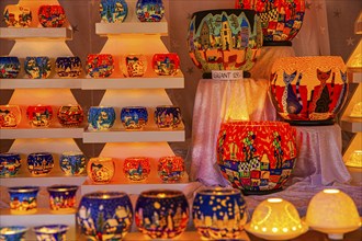 Colourful tea lights in a stall at the Christmas market at City Hall, Vienna, Austria, Europe