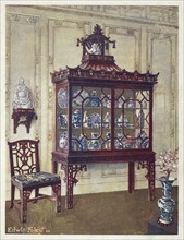 Furniture around the turn of the century 1900, Carved porcelain case in Chippendale's Chinese