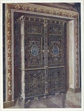 Furniture around the turn of the century 1900, Cabinet in ebony with inlays of engraved brass and