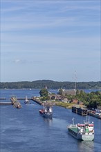 Cargo ships waiting in front of the lock, Kiel Canal, Holtenau, Kiel, Schleswig-Holstein, Germany,