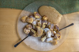 Franconian Kaiserschmarrn with apple sauce served in an inn, Franconia, Bavaria, Germany, Europe