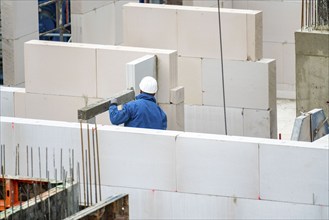 Construction site, new construction of apartment blocks, shell construction, North