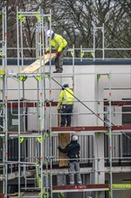 Construction site, scaffolding, dismantling of scaffolding on a residential building, Germany,