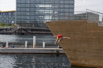 Summer, swimming in the harbour of Copenhagen, there are official bathing places, harbour baths and