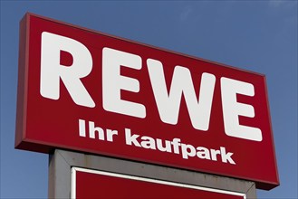 Signboard billboard with logo of retail chain retailer REWE ihr Kaufpark, Germany, Europe