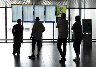 Info screens for departures, arrivals at Amsterdam Schiphol Airport, Terminal, Netherlands