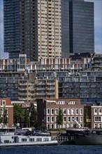 Harbour basin of the Maashaven, inland waterway port, jetties, residential buildings in the Kop van