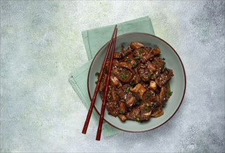 Bulgogi, with mushrooms, with sesame seeds and green onions, Korean cuisine, homemade, no people