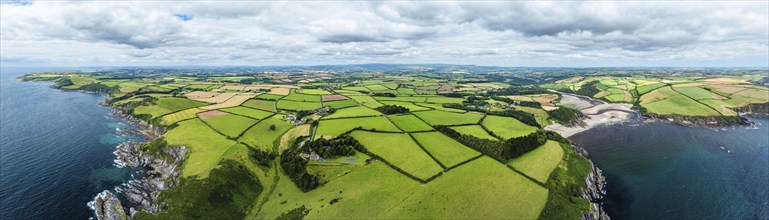 Panorama of Cliffs over Mothecombe Beach and Red Cove from a drone, River Emme, Mothecombe,