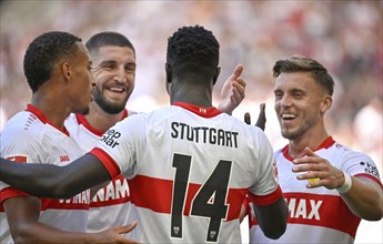 Goal celebration Silas Katompa Mvumpa VfB Stuttgart (14) (centre) Jamie Leweling VfB Stuttgart (18)