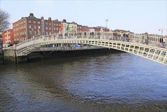 Ha'penny Bridge, historic pedestrian bridge crossing River Liffey, city of Dublin, Ireland, Irish