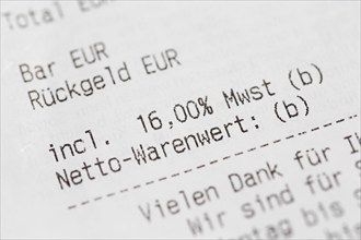 Close-up of a till receipt showing the reduction in VAT to sixteen per cent in Germany due to the