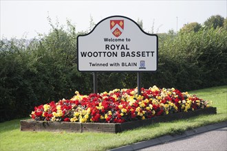 Welcome sign for Royal Wootton Basett granted royal patronage in 2011, Wiltshire, England, UK