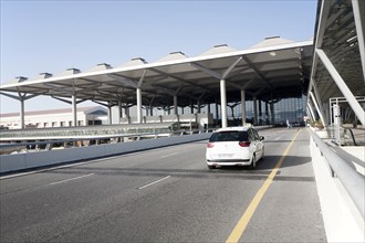 White taxi car arriving at Malaga airport, Spain, Europe