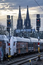 RRX train on the track in front of Cologne Central Station, Hohenzollern Bridge, Cologne Cathedral,