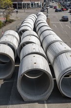 Concrete sewer pipes, stored on a construction site during sewer renovation work, on the Dickswall,