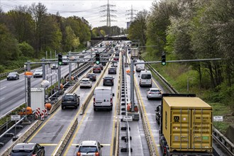 Weighing and barrier system on the A42 motorway, in front of the dilapidated motorway bridge over