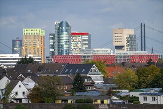 The skyline of Düsseldorf, with the skyscrapers in the Media Harbour, Rhine bridges, in front