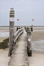 Pier at low tide, wooden jetty, Utersum, Föhr, North Sea island, North Frisia, Schleswig-Holstein,