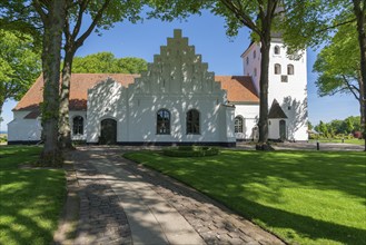 Bogense on the Kattegat, St Nicolas Church, Danish architecture, stepped gables, group of trees,