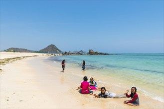 Girl at Mandalika beach in Kuta, beach, tourism, travel, holiday, beach holiday, beach holiday,