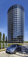 A VW car with car tower for the delivery of new cars on the grounds of the Autostadt, Volkswagen