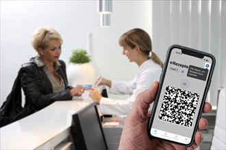 Symbolic image of an e-prescription, prescription issued by a doctor, with QR code, is scanned