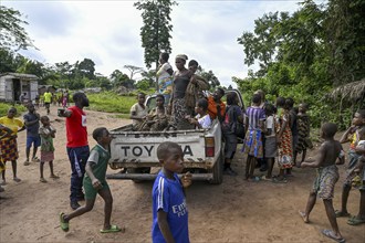 Pygmies of the Baka or BaAka people on a pickup truck, Bayanga, Sangha-Mbaéré Prefecture, Central