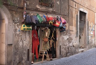 Small second hand shop in a side alleyway, Campo de Fiori, Rome. Italy