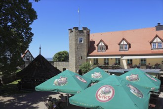 Sunshades of the beer garden on the castle ruins on the Schlossberg, Königsberg in Bavaria,