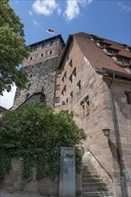 Pentagonal tower and imperial stables, former granary, built around 1494, now a youth hostel,