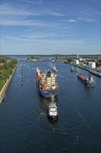 Cargo ships waiting in front of the lock, Kiel Canal, Holtenau, Kiel, Schleswig-Holstein, Germany,