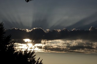 Sky with clouds and sunbeams, August, Germany, Europe