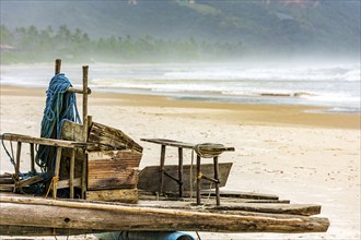 Primitive fishing boat used in northeastern Brazil called Jangada made with wooden trunks, Serra