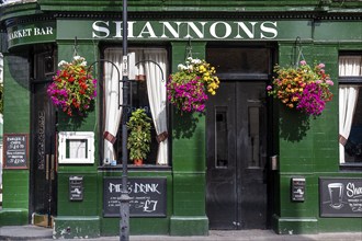 Green tiled façade and black doors, Shannons, Pub, Portobello Road, Notting Hill, London, England,