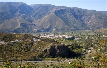 The town of Orgiva in its valley, Alpujarras, Sierra Nevada, Spain, Europe