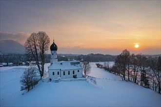 Sunset, Church of the Visitation of the Virgin Mary in winter, Oberbuchen, drone shot, Tölzer Land,