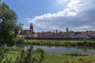 City view with St Peter's Cathedral and Stone Bridge, in front an arm of the Danube, Regensburg,