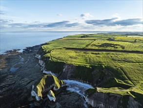 Cliffs over Flamborough Seawatch Observatory from a drone, Flamborough, Yorkshire, England, United