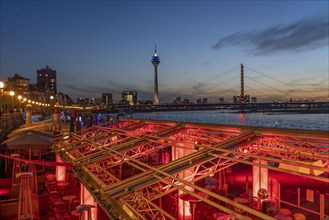 Gastronomy, Evening on the banks of the Rhine in Düsseldorf, Rhine knee bridge, Skyline of